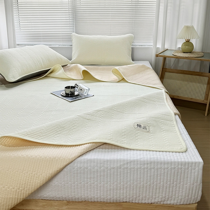 91家纺网 家纺一手货源 找家纺 拾小柒 2025新款全棉色织水洗棉夹棉防滑床盖防水纯色床护垫 防滑款鹅黄色