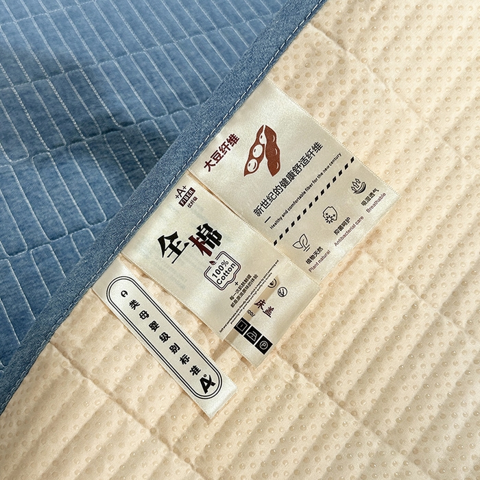 91家纺网 家纺一手货源 找家纺 拾小柒 2025新款纯色全棉色织水洗棉夹棉防滑床盖 牛仔蓝