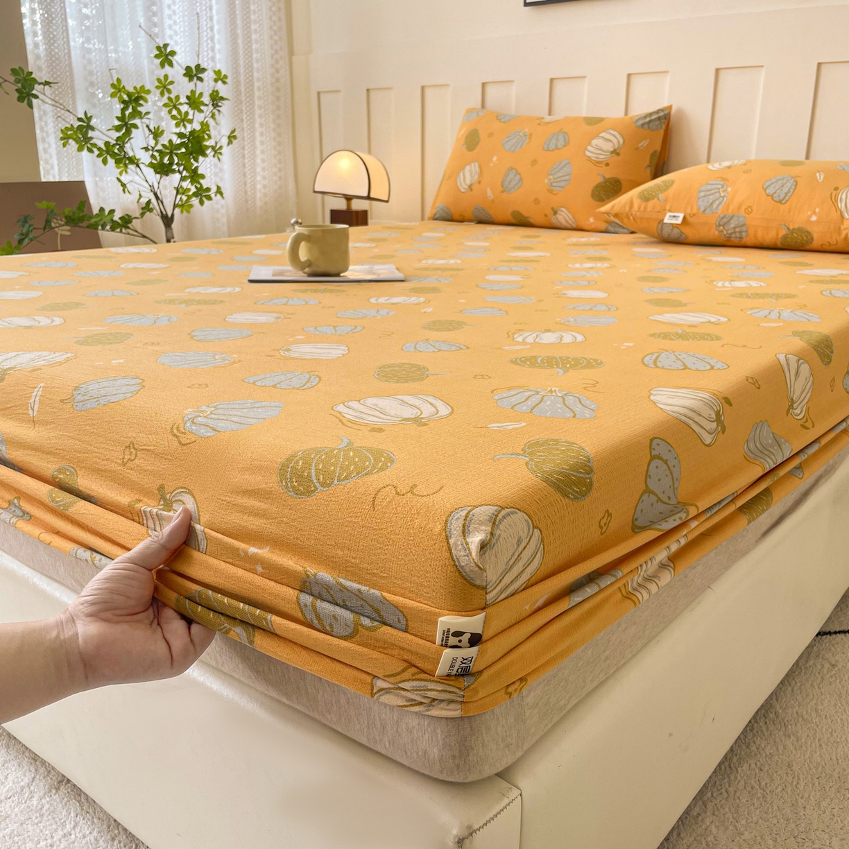 91家纺网 家纺一手货源 找家纺 棉乐町家居 2025新款木棉双层纱印花床笠 可爱南瓜