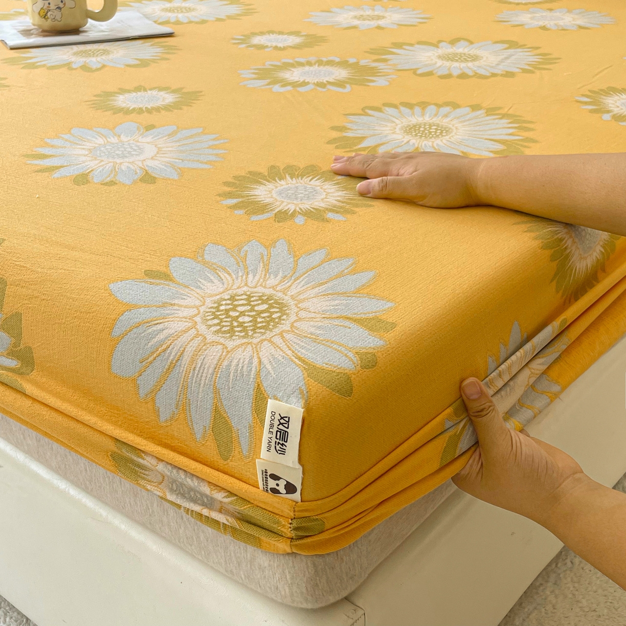 91家纺网 家纺一手货源 找家纺 棉乐町家居 2025新款木棉双层纱印花床笠 向阳花-桔黄