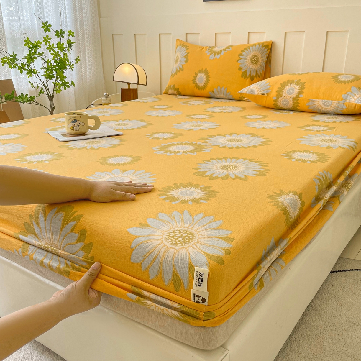 91家纺网 家纺一手货源 找家纺 棉乐町家居 2025新款木棉双层纱印花床笠 向阳花-桔黄