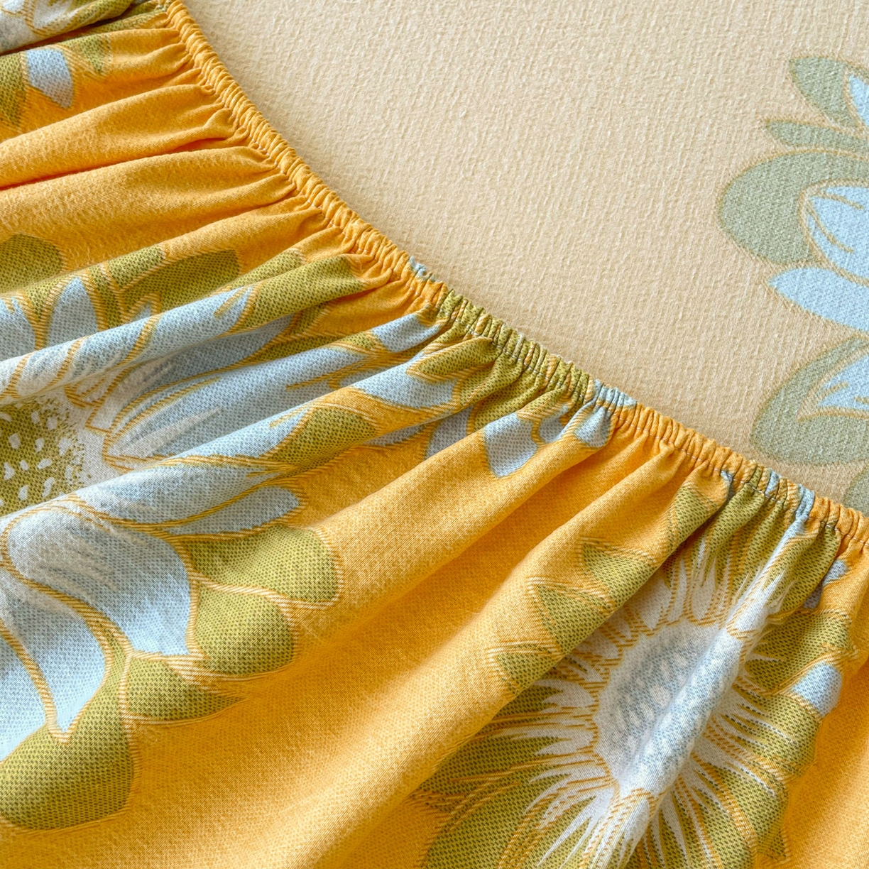 91家纺网 家纺一手货源 找家纺 金泰莱 2025新款木棉双层纱印花床笠 向阳花-桔黄