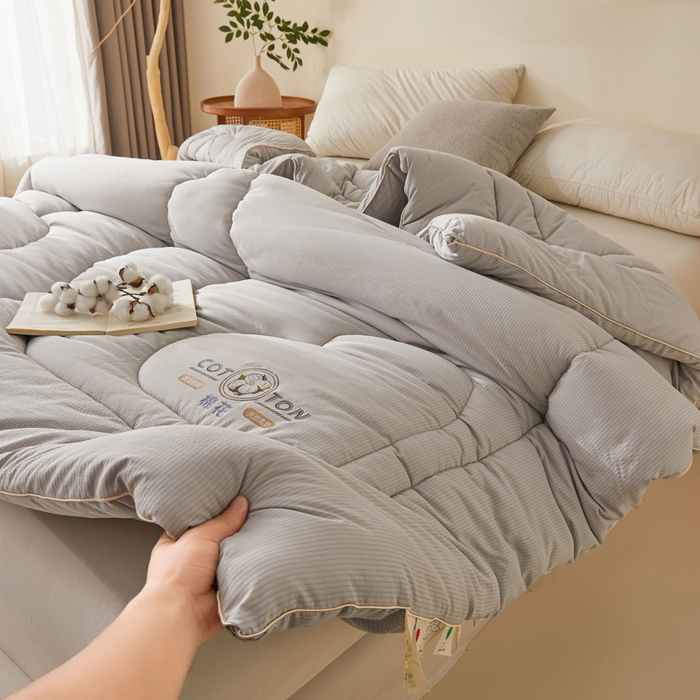 91家纺网 家纺一手货源 找家纺 悦然毛巾被 2025新款小提花棉花冬被被子被芯 棉语提花被-灰