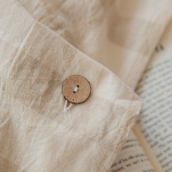 91家纺网 家纺一手货源 找家纺 （总）贝尔 PELLHOME 简约格子纽扣棉麻透气舒适亚麻四件套床单被套场景二（可抖音代发）