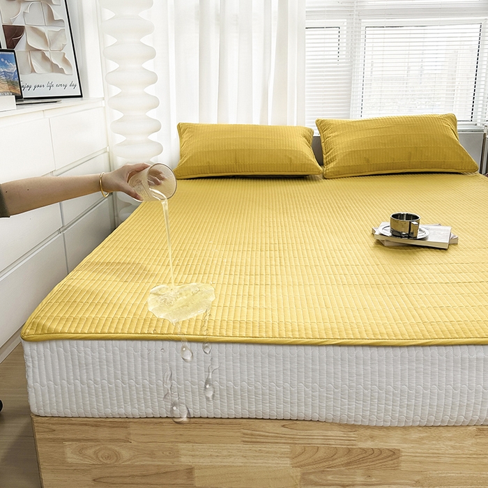 91家纺网 家纺一手货源 找家纺 拾小柒 2025新款纯色全棉色织水洗棉防水隔尿床护垫床盖 姜黄色