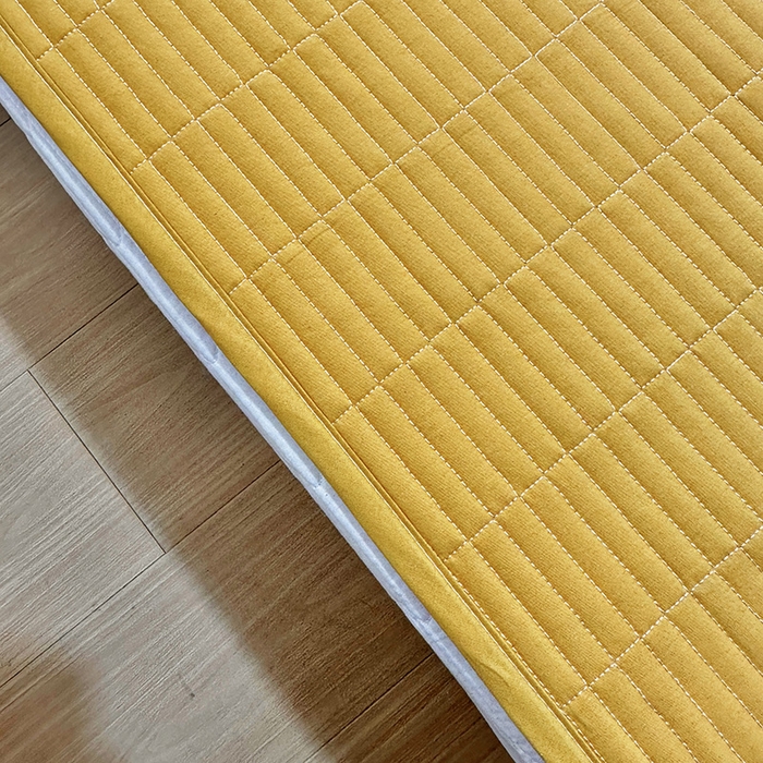 91家纺网 家纺一手货源 找家纺 拾小柒 2025新款纯色全棉色织水洗棉防水隔尿床护垫床盖 姜黄色