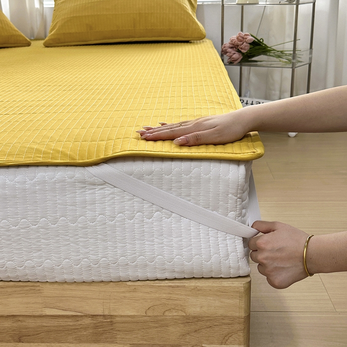 91家纺网 家纺一手货源 找家纺 拾小柒 2025新款纯色全棉色织水洗棉防水隔尿床护垫床盖 姜黄色