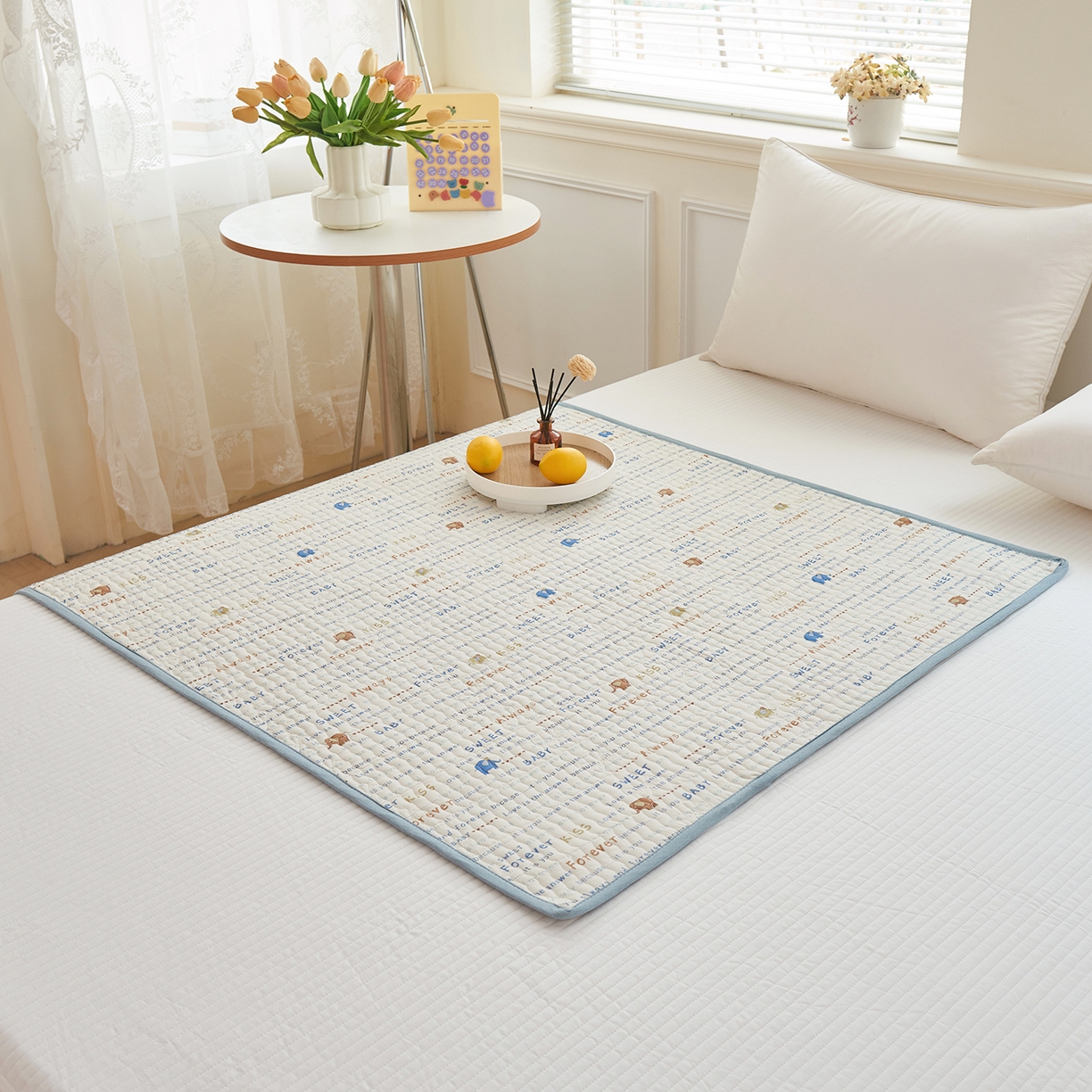 91家纺网 家纺一手货源 找家纺 拾小柒 2025年新款全棉双层纱防水隔脏姨妈垫护理垫隔尿垫 英文象蓝（防水款）