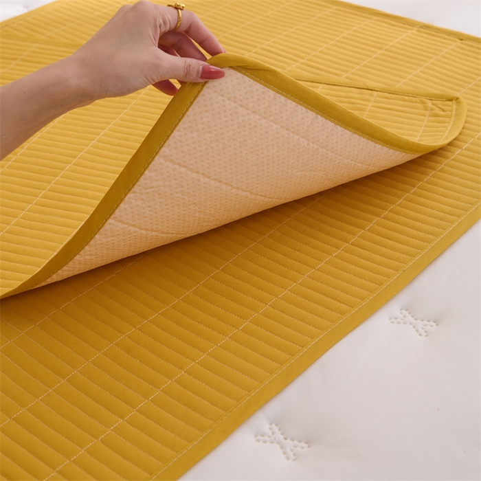 91家纺网 家纺一手货源 找家纺 拾小柒 2025新款全棉色织水洗棉防水隔脏姨妈垫护理垫 姜黄色