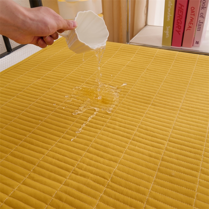 91家纺网 家纺一手货源 找家纺 拾小柒 2025新款全棉色织水洗棉防水隔脏姨妈垫护理垫 姜黄色