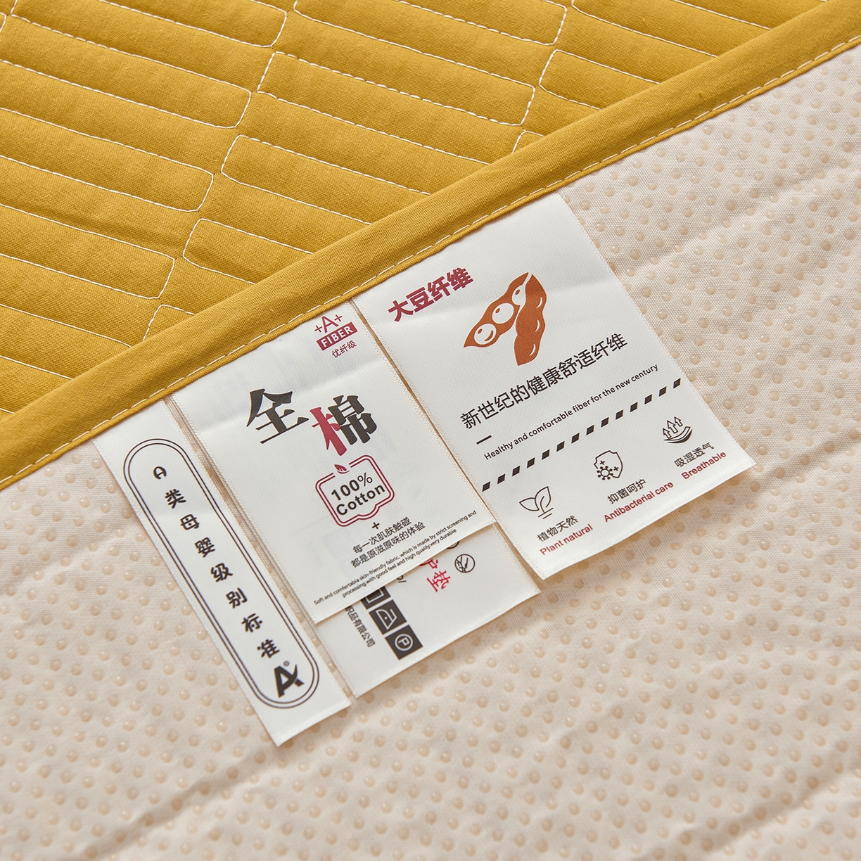 91家纺网 家纺一手货源 找家纺 拾小柒 2025新款A类全棉水洗棉床盖防水隔尿床护垫防滑隔脏姨妈垫 姜黄色