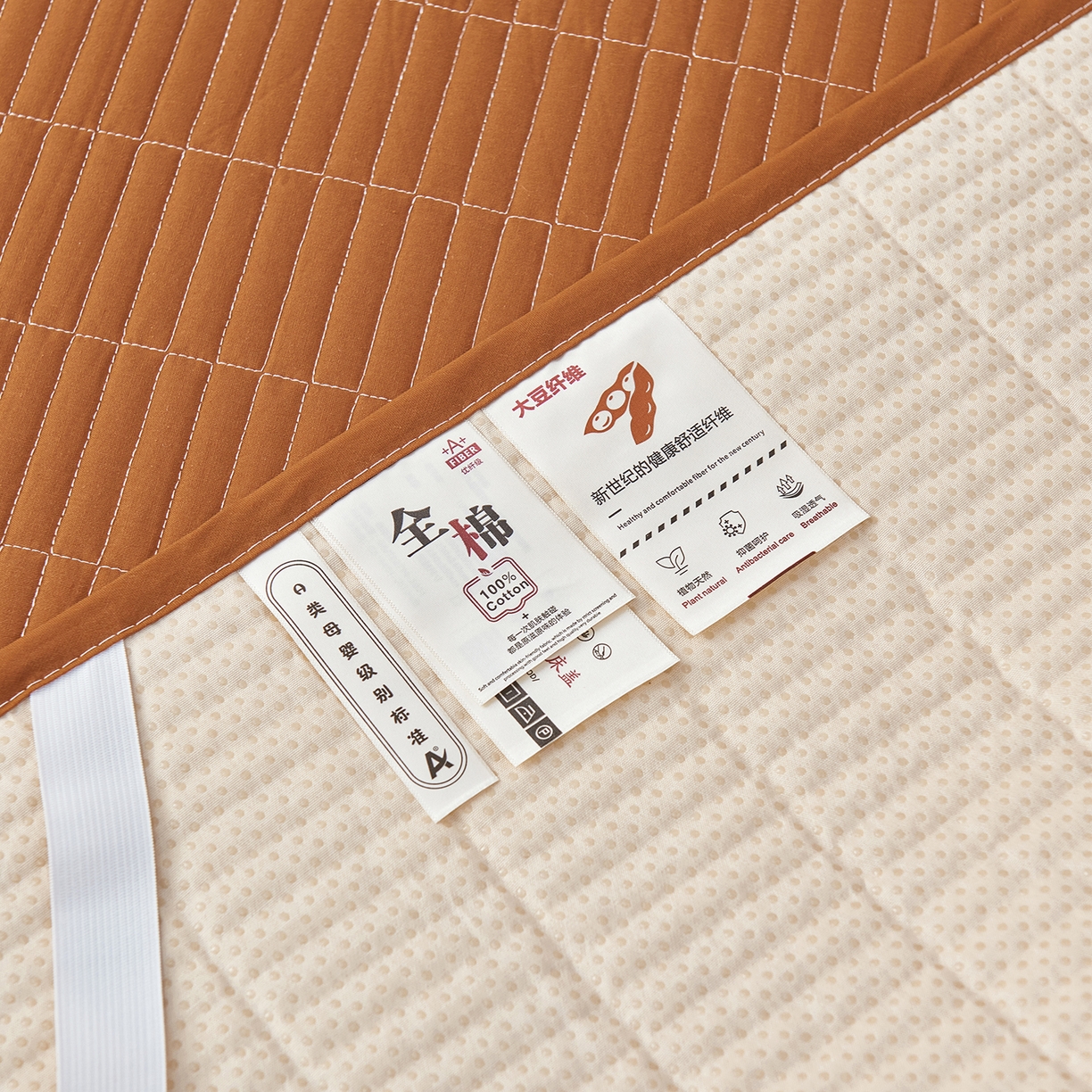 91家纺网 家纺一手货源 找家纺 拾小柒 2025新款A类全棉水洗棉床盖防水隔尿床护垫防滑隔脏姨妈垫 焦糖色
