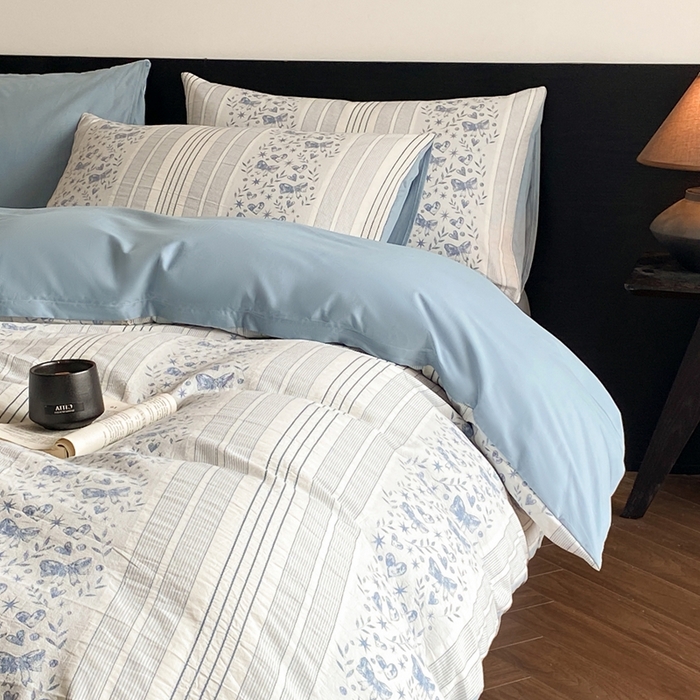 91家纺网 家纺一手货源 找家纺 言一 2025秋冬新品A类60S新疆长绒棉纯棉陶瓷轻磨毛四件套水洗棉提花全棉床单被套 蝶栩-天青藍