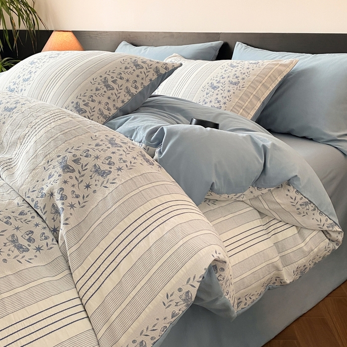 91家纺网 家纺一手货源 找家纺 言一 2025秋冬新品A类60S新疆长绒棉纯棉陶瓷轻磨毛四件套水洗棉提花全棉床单被套 蝶栩-天青藍