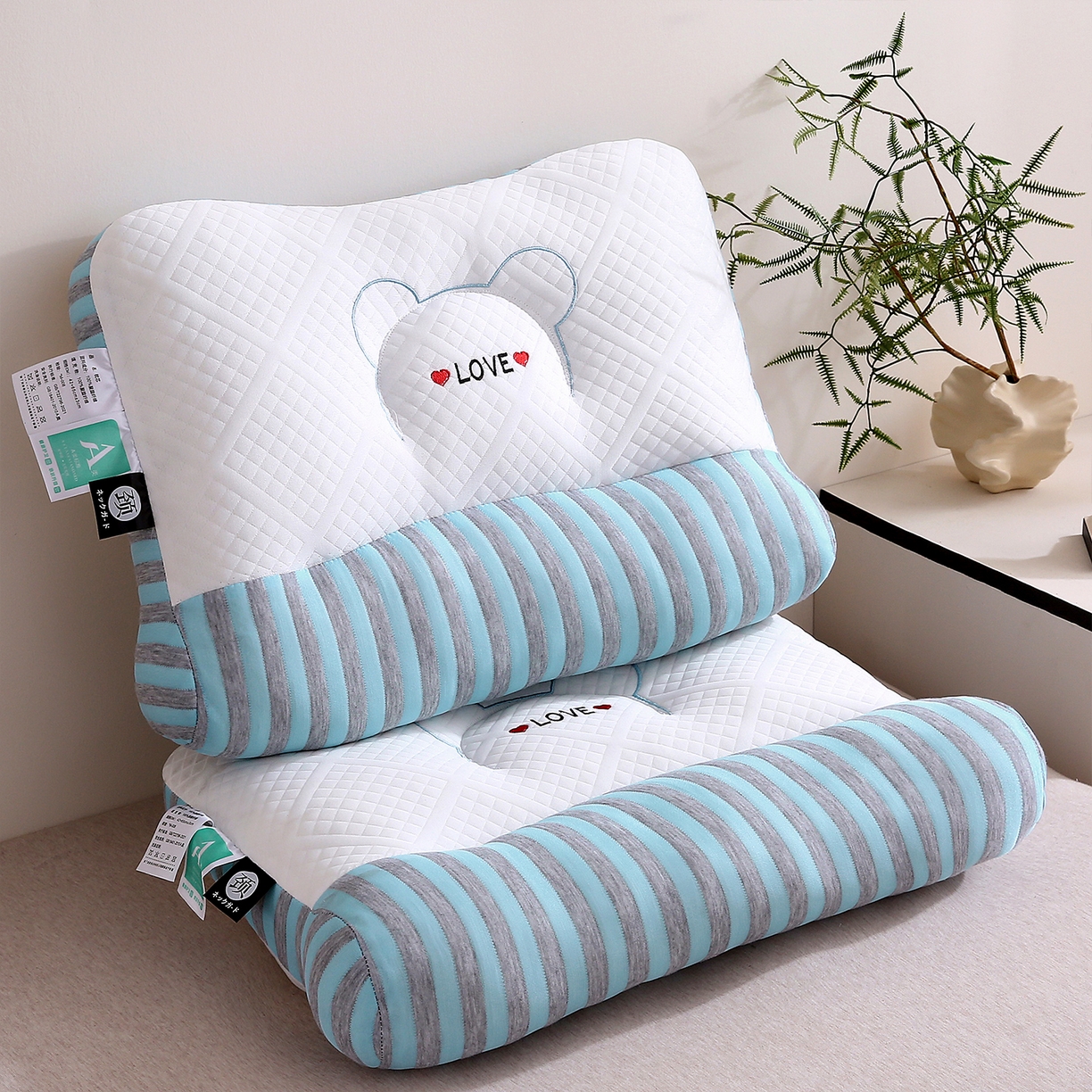 91家纺网 家纺一手货源 找家纺 梦叶草 2025新款SPA护颈椎枕助睡眠情侣反牵引侧睡枕头枕芯 情侣LOVE护颈枕-蓝色