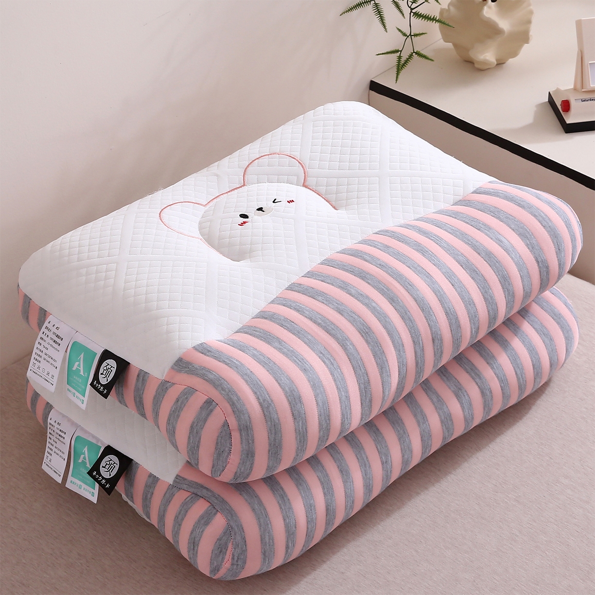 91家纺网 家纺一手货源 找家纺 梦叶草 2025新款SPA护颈椎枕助睡眠情侣反牵引侧睡枕头枕芯 情侣笑脸护颈枕-粉色