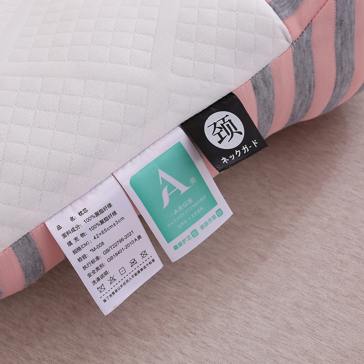 91家纺网 家纺一手货源 找家纺 梦叶草 2025新款SPA护颈椎枕助睡眠情侣反牵引侧睡枕头枕芯 情侣笑脸护颈枕-粉色