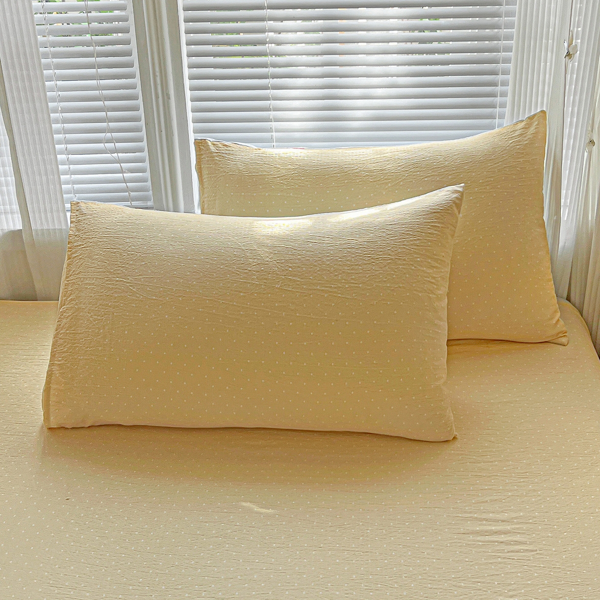 91家纺网 家纺一手货源 找家纺 格真 2025新款A类云感木棉皱皱双层纱床单单床单床单单品床单三件套 波点-奶油黄