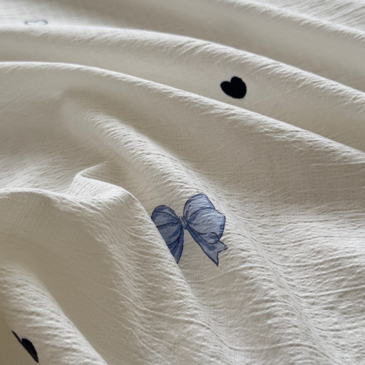 91家纺网 家纺一手货源 找家纺 叠派家纺 2025新款A类双层纱提花单品床笠系列 爱心蝴蝶结