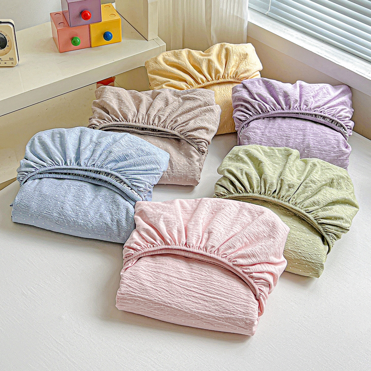 91家纺网 家纺一手货源 找家纺 （总）格真 2025秋冬新款110克高克重提花加厚皱皱纱双层纱印花单床笠