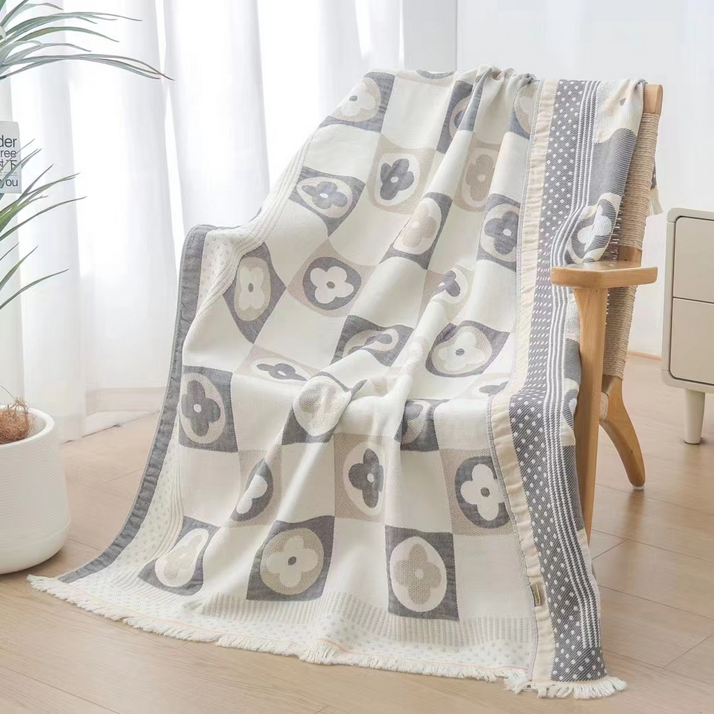 91家纺网 家纺一手货源 找家纺 红淳家纺 2025新款全棉轻奢编织沙发毯空调盖毯薄被 轻奢四叶草