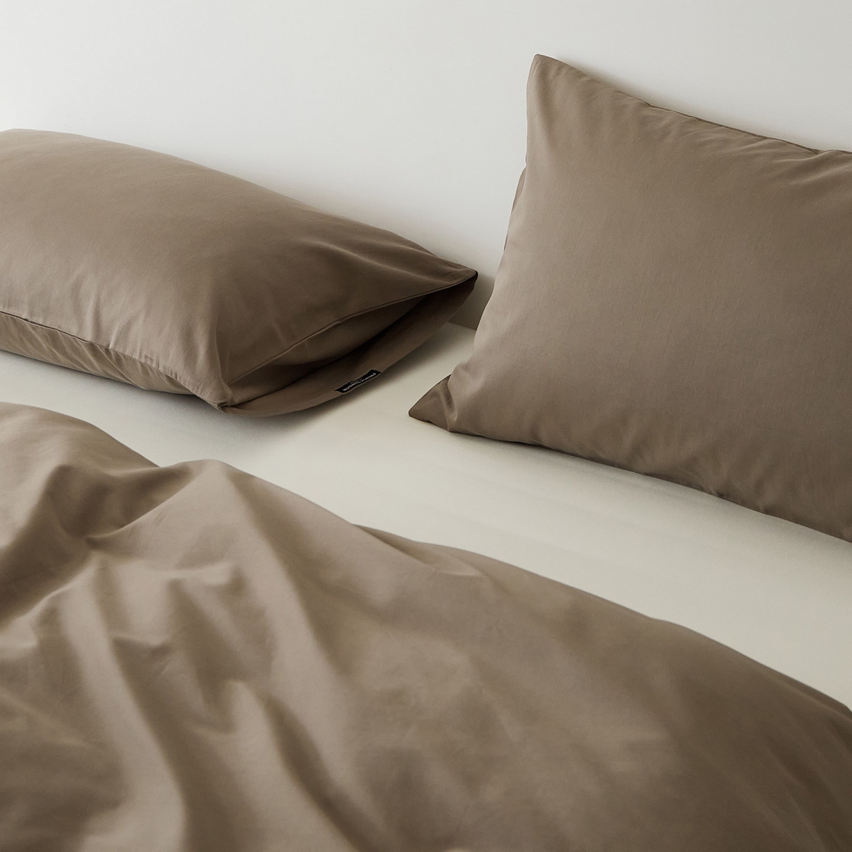 91家纺网 家纺一手货源 找家纺 EH家居 2025新款全棉磨毛纯色单枕套-云栖系列 云栖-高级咖