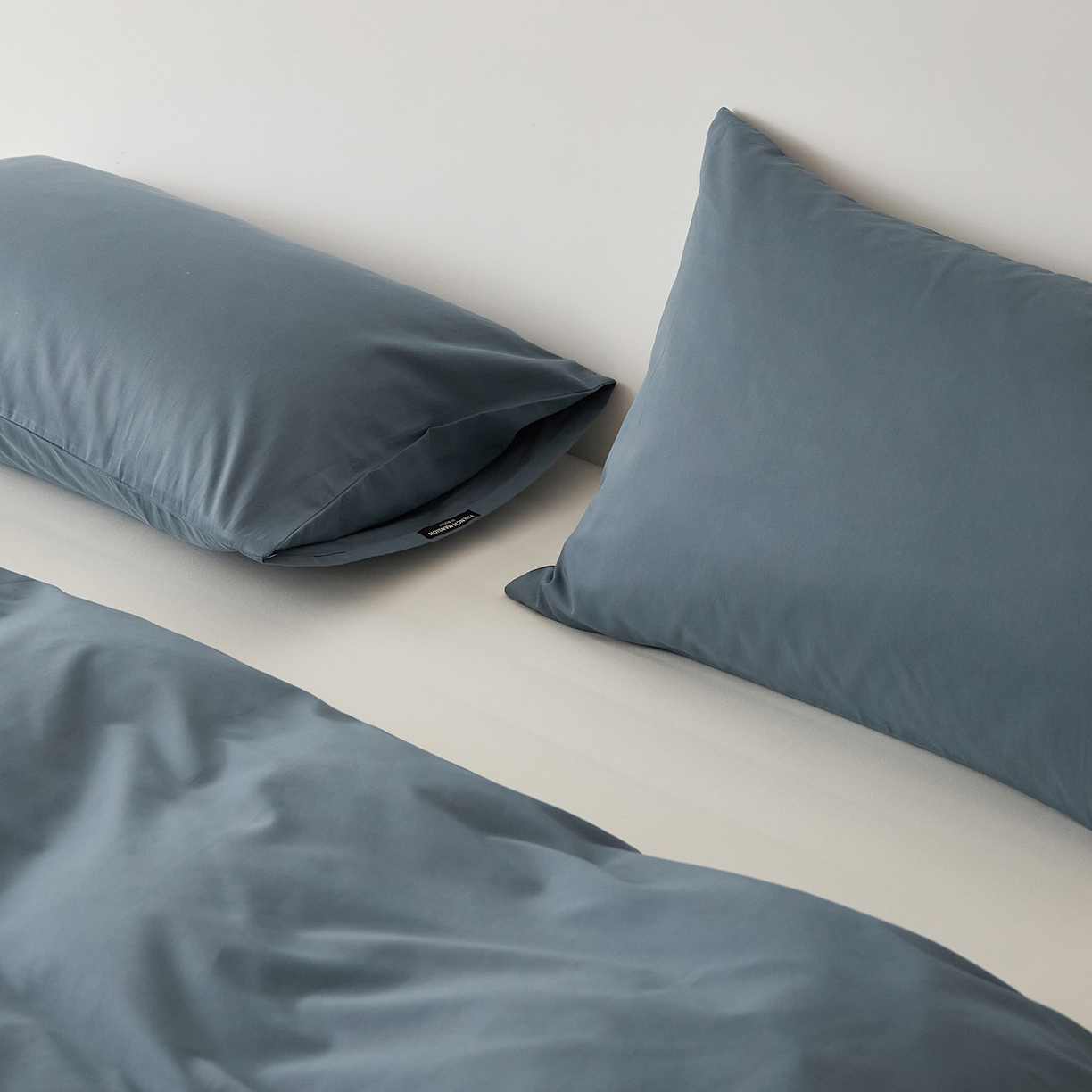 91家纺网 家纺一手货源 找家纺 EH家居 2025新款全棉磨毛纯色单枕套-云栖系列 云栖-南菲蓝