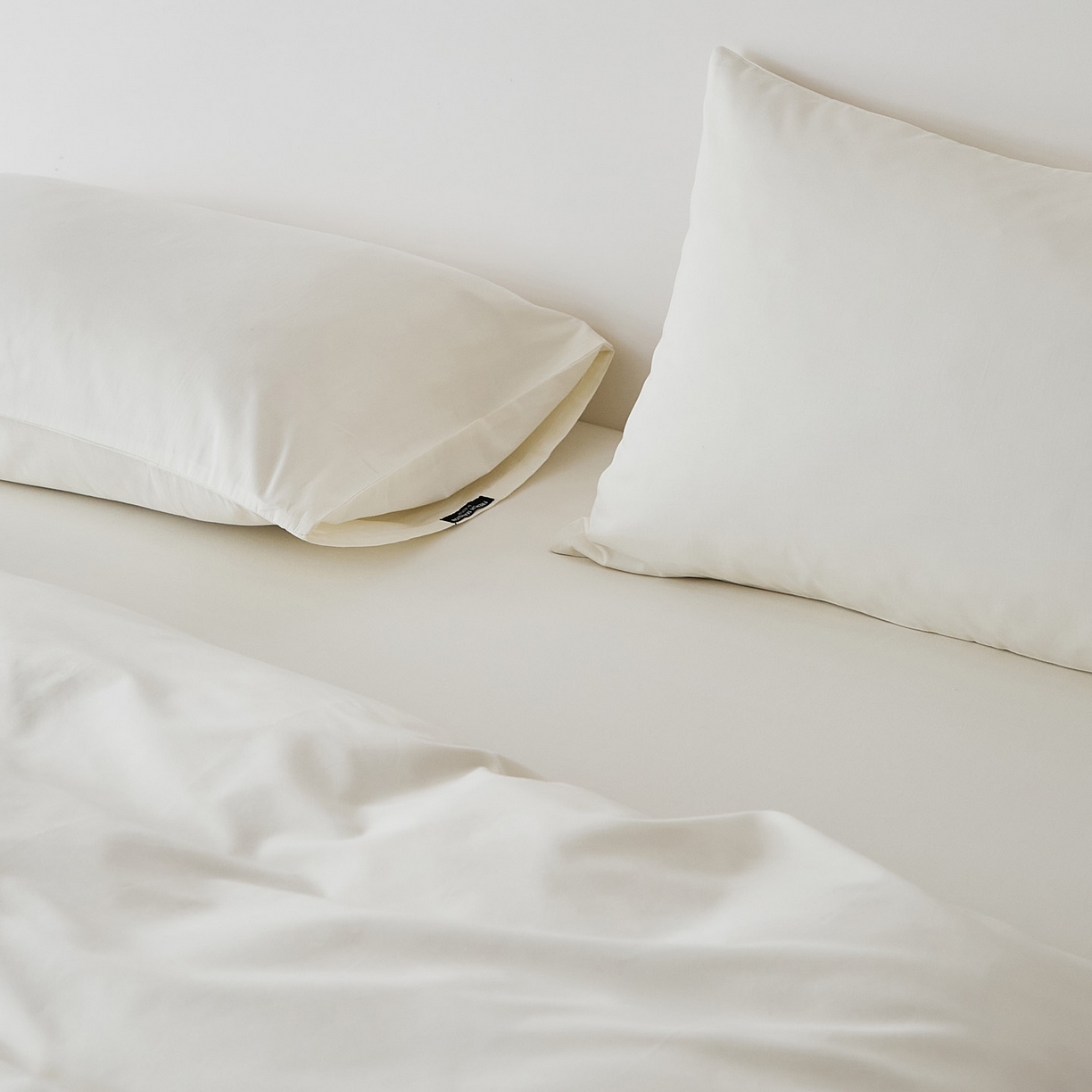 91家纺网 家纺一手货源 找家纺 EH家居 2025新款全棉磨毛纯色单枕套-云栖系列 云栖-羽白