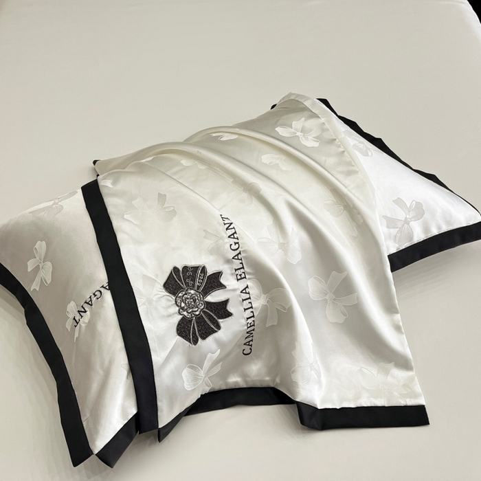 91家纺网 家纺一手货源 找家纺 金牛座家纺 2025新款贡缎提花磨毛亲肤棉刺绣四件套-蝴蝶结 蝴蝶结-奶白