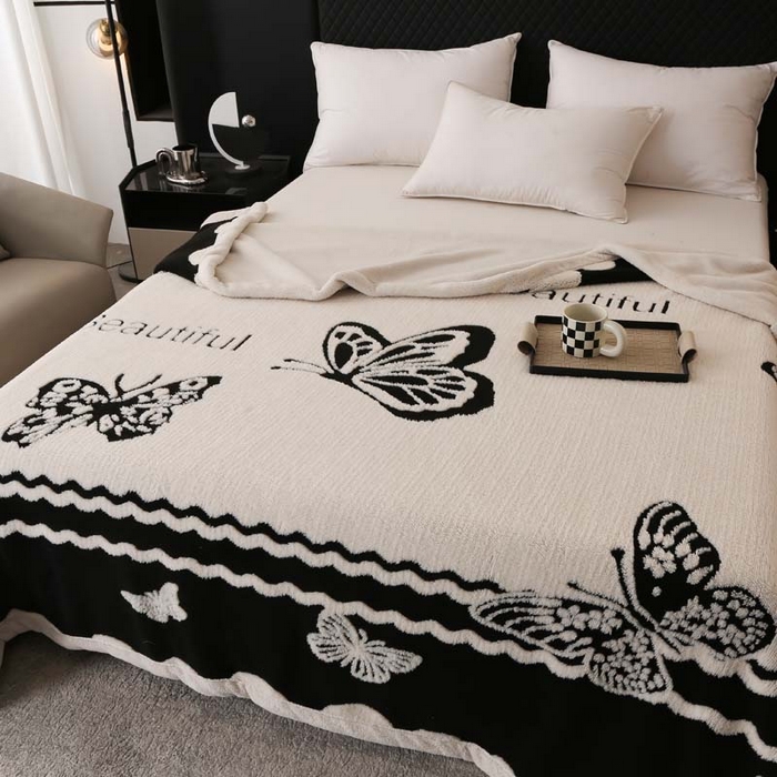 91家纺网 家纺一手货源 找家纺 卡奥家纺 2025新款双层提花复合欧棉绒毛毯 蝶颜