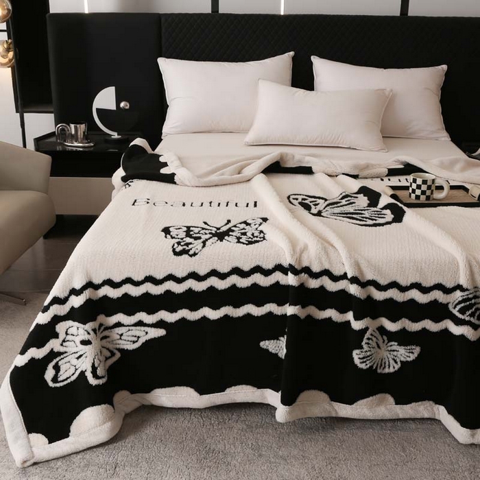 91家纺网 家纺一手货源 找家纺 卡奥家纺 2025新款双层提花复合欧棉绒毛毯 蝶颜