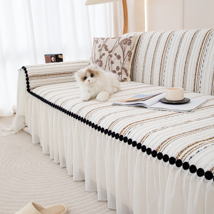 91家纺网 家纺一手货源 找家纺 沐沐家纺 2026新款织织暮圆点沙发巾-场景一 浅咖