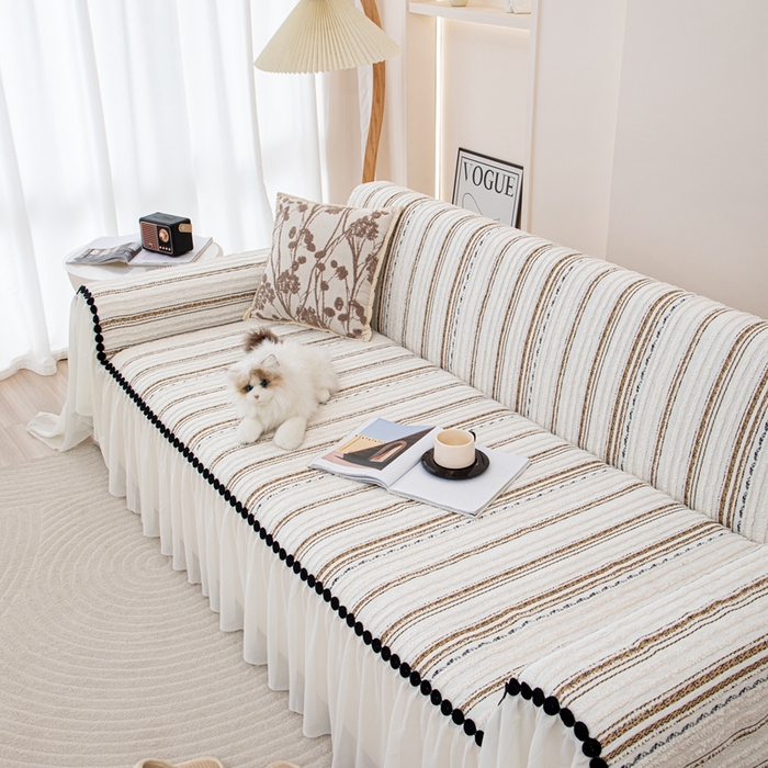 91家纺网 家纺一手货源 找家纺 沐沐家纺 2026新款织织暮圆点沙发巾-场景一 浅咖