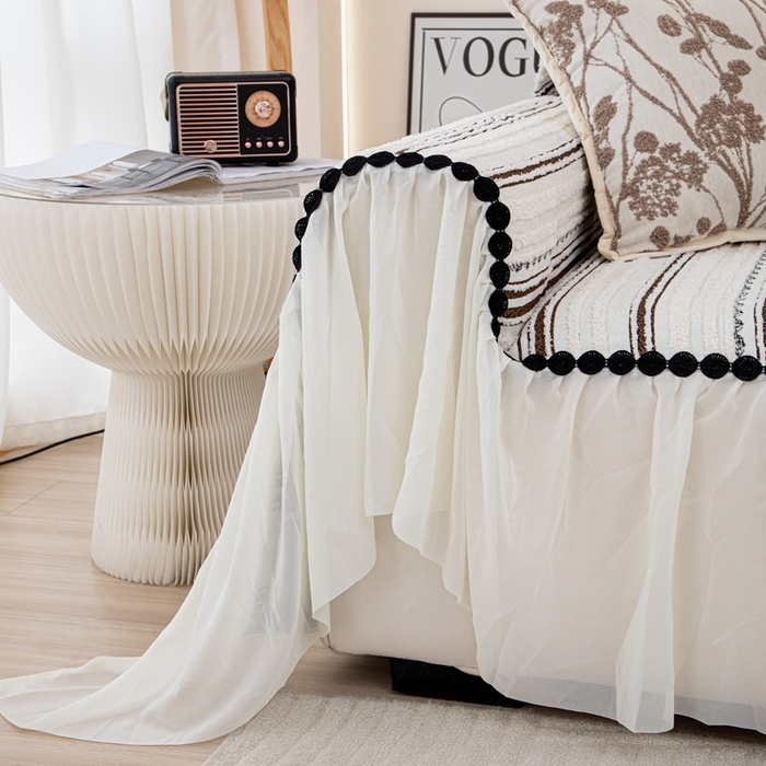 91家纺网 家纺一手货源 找家纺 沐沐家纺 2026新款织织暮圆点沙发巾-场景一 深咖