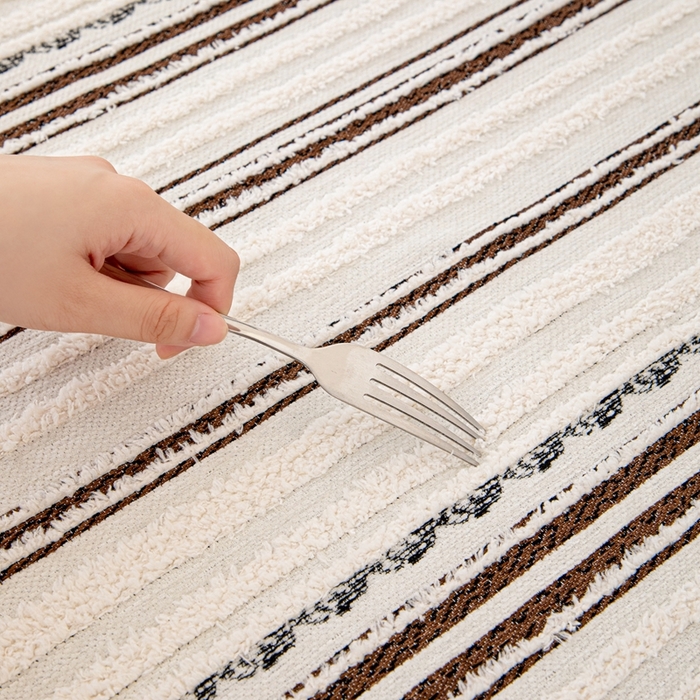 91家纺网 家纺一手货源 找家纺 沐沐家纺 2026新款织织暮圆点沙发巾-场景一 深咖