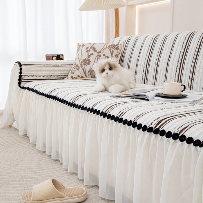 91家纺网 家纺一手货源 找家纺 沐沐家纺 2026新款织织暮圆点沙发巾-场景一 深咖