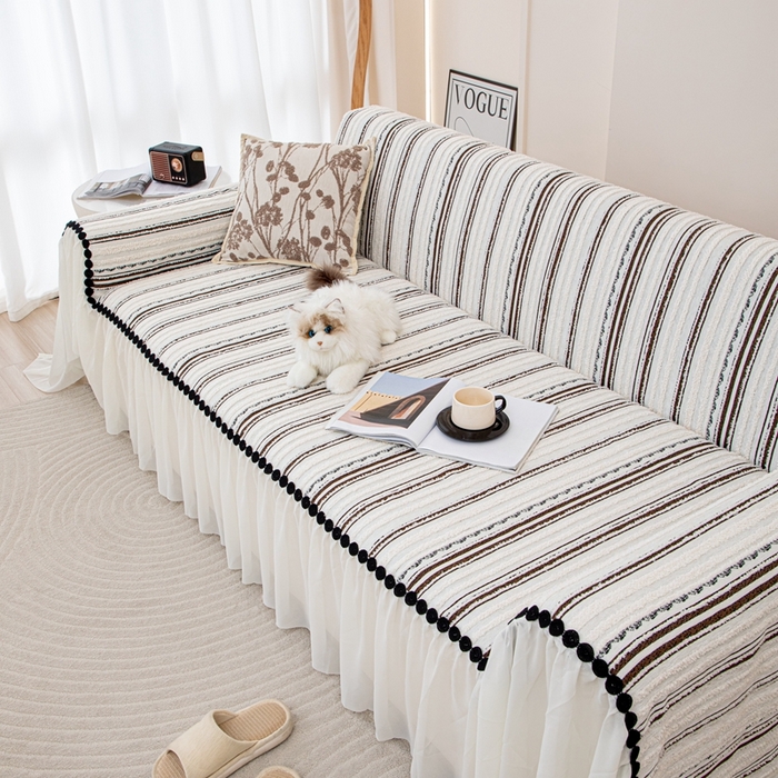 91家纺网 家纺一手货源 找家纺 沐沐家纺 2026新款织织暮圆点沙发巾-场景一 深咖