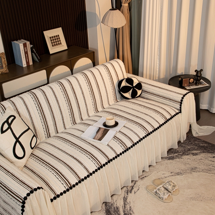 91家纺网 家纺一手货源 找家纺 沐沐家纺 2026新款织织暮圆点沙发巾-场景二 深咖