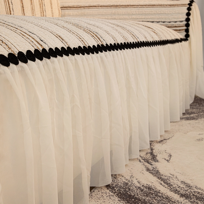 91家纺网 家纺一手货源 找家纺 沐沐家纺 2026新款织织暮圆点沙发巾-场景二 浅咖