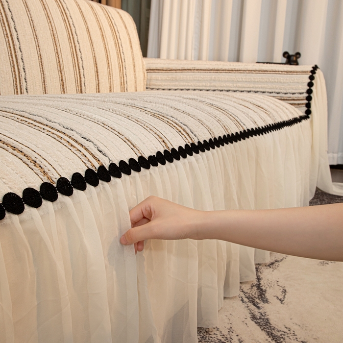 91家纺网 家纺一手货源 找家纺 沐沐家纺 2026新款织织暮圆点沙发巾-场景二 浅咖