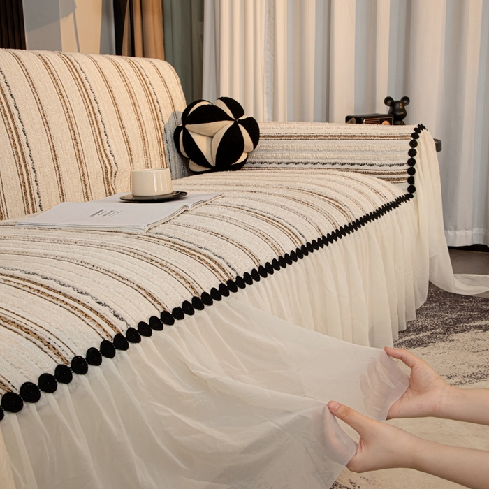 91家纺网 家纺一手货源 找家纺 沐沐家纺 2026新款织织暮圆点沙发巾-场景二 浅咖