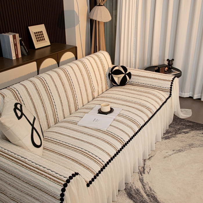 91家纺网 家纺一手货源 找家纺 沐沐家纺 2026新款织织暮圆点沙发巾-场景二 浅咖