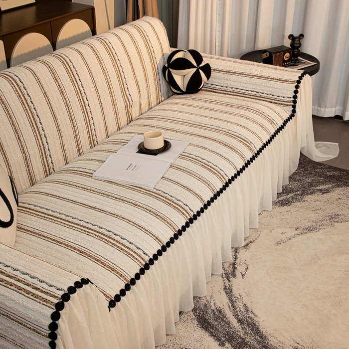 91家纺网 家纺一手货源 找家纺 沐沐家纺 2026新款织织暮圆点沙发巾-场景二 浅咖