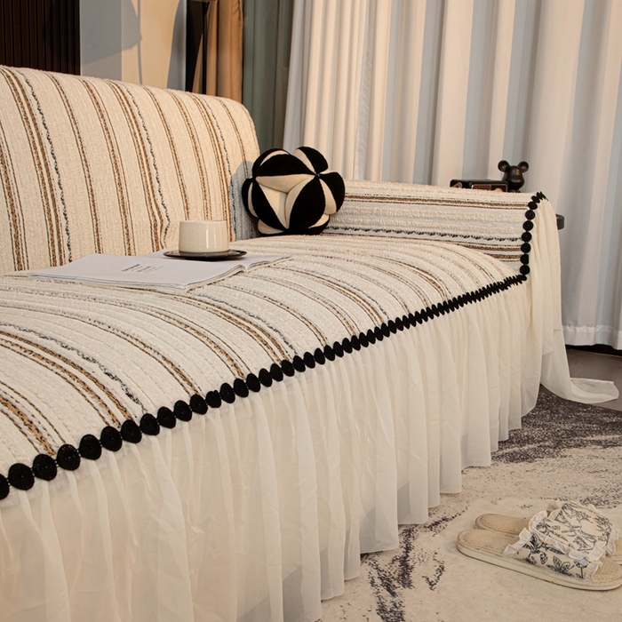 91家纺网 家纺一手货源 找家纺 沐沐家纺 2026新款织织暮圆点沙发巾-场景二 浅咖