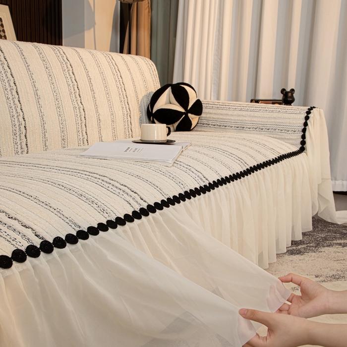 91家纺网 家纺一手货源 找家纺 沐沐家纺 2026新款织织暮圆点沙发巾-场景二 浅灰