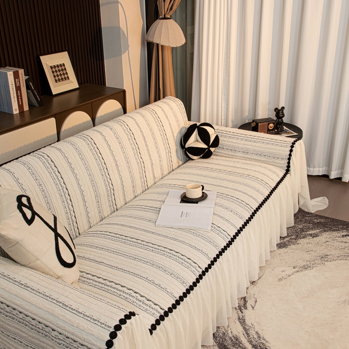 91家纺网 家纺一手货源 找家纺 沐沐家纺 2026新款织织暮圆点沙发巾-场景二 浅灰