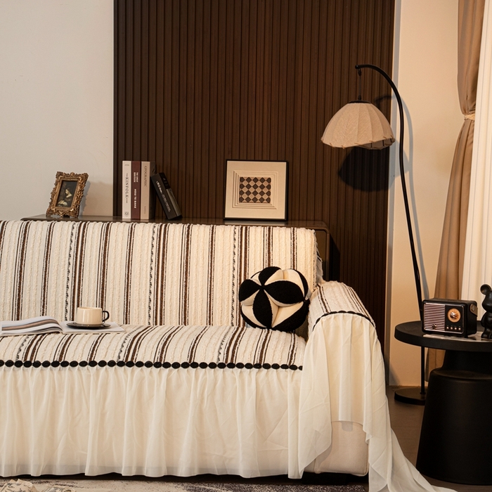 91家纺网 家纺一手货源 找家纺 沐沐家纺 2026新款织织暮圆点沙发巾-场景二 深咖