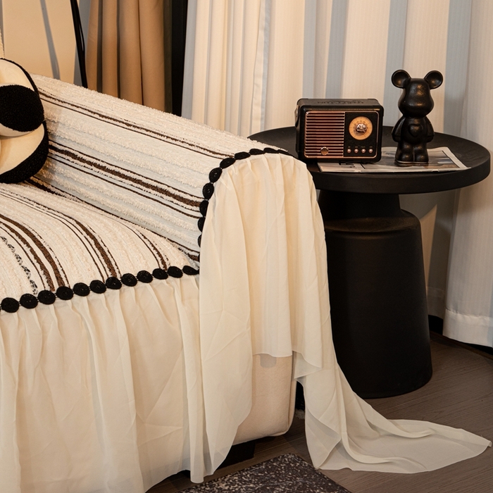 91家纺网 家纺一手货源 找家纺 沐沐家纺 2026新款织织暮圆点沙发巾-场景二 深咖