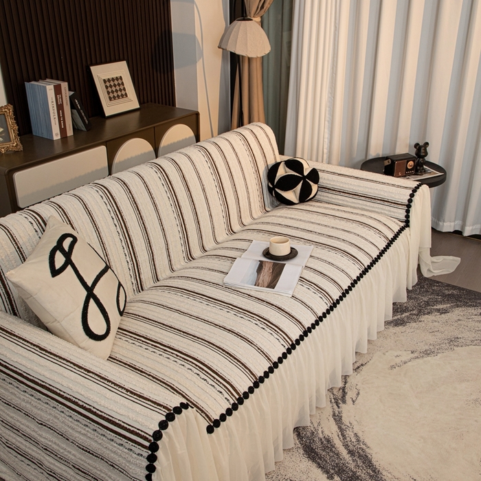 91家纺网 家纺一手货源 找家纺 沐沐家纺 2026新款织织暮圆点沙发巾-场景二 深咖