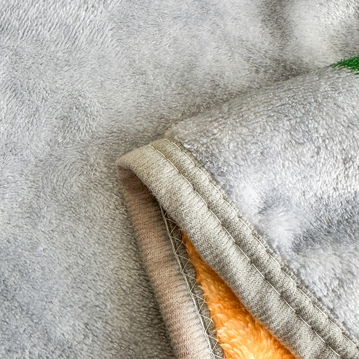 91家纺网 家纺一手货源 找家纺 欧喜璐 2025新款卡通印花加厚牛奶绒多功能毛毯 橘子